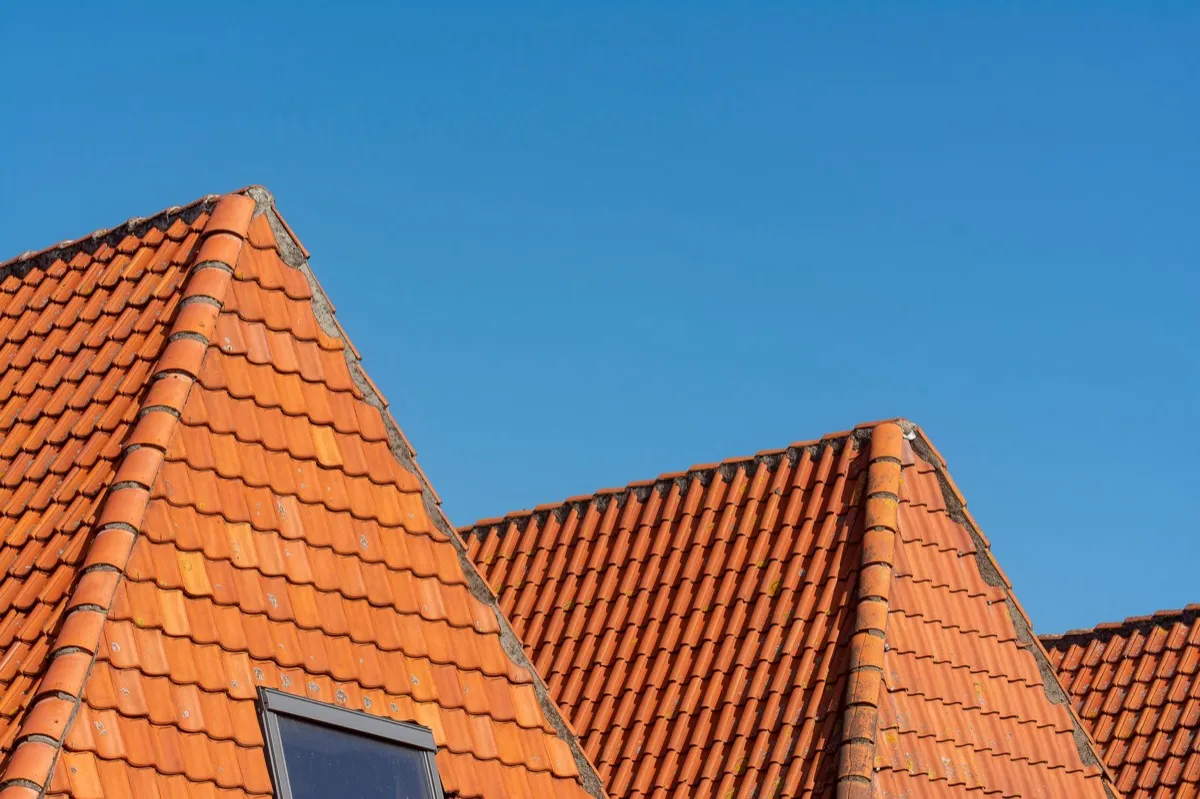 Clay barrel tile rooflines on homes in Reston, VA