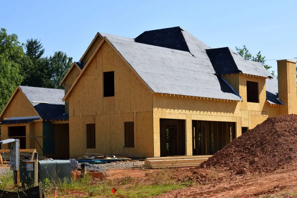 House with new roof decking and synthetic underlayment during a roof replacement in Reston, VA